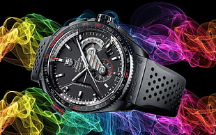 round black chronograph watch with black strap