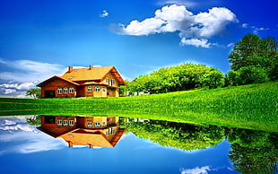 beige wooden house near body of water under cirrus clouds HD wallpaper