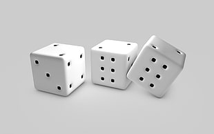 three white 6-sided dices