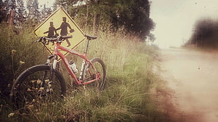 red hardtail bike, mountain bikes, traffic signs