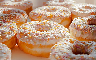 closeup photography of doughnut with sprinklers on top