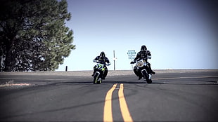 two white-and-black motorcycles, motorcycle, road