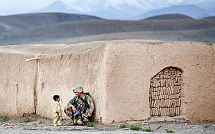 brown wall brick, soldier, Afghanistan, children, house
