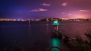 brown dock and light tower, water, lighthouse, dusk, city HD wallpaper