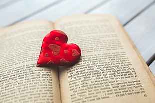 red heart on book