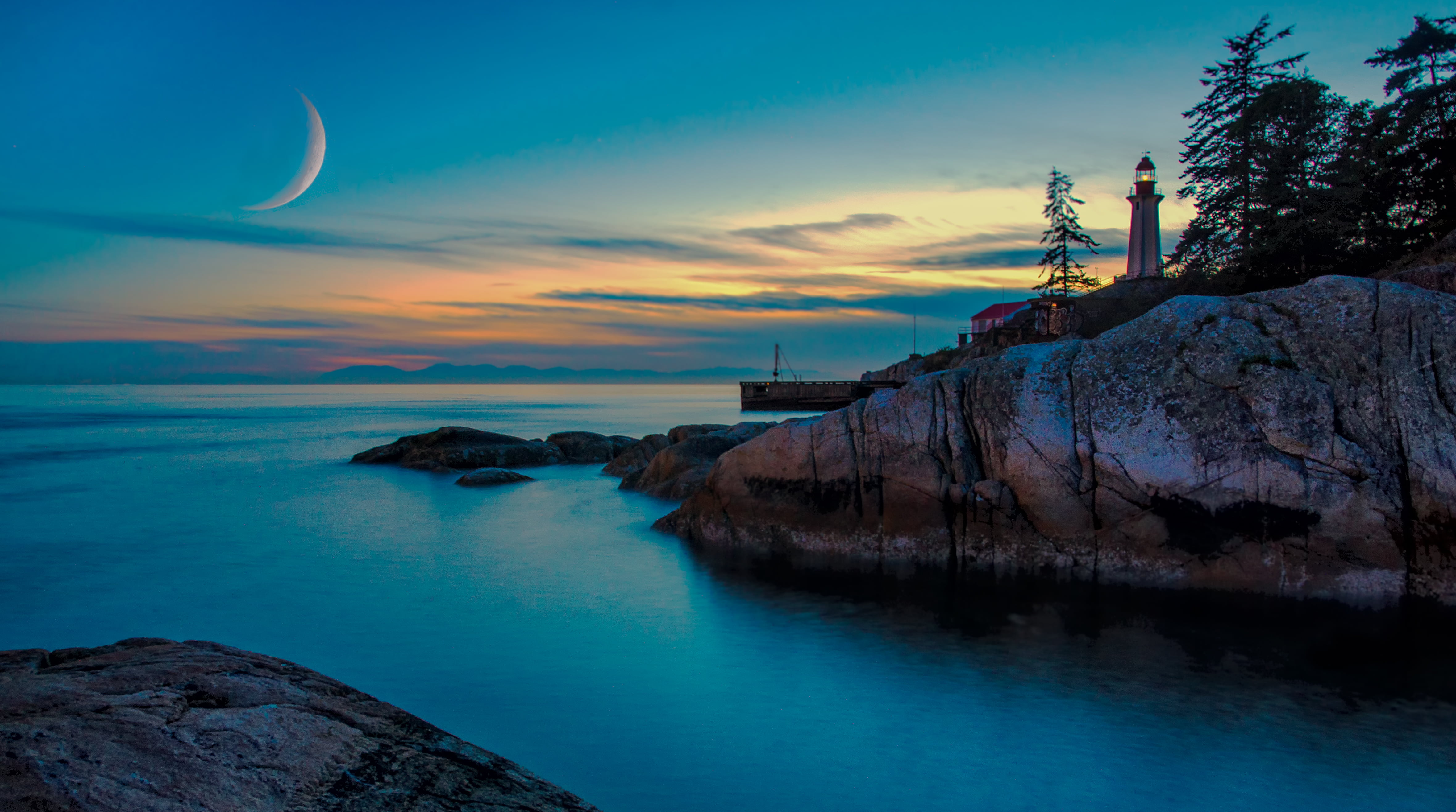 lighthouse near trees at daytime