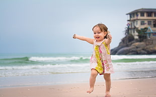 girl standing near the beach during daytime HD wallpaper