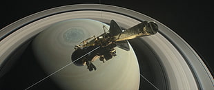 gray satellite, NASA, Saturn, Cassini, orbits