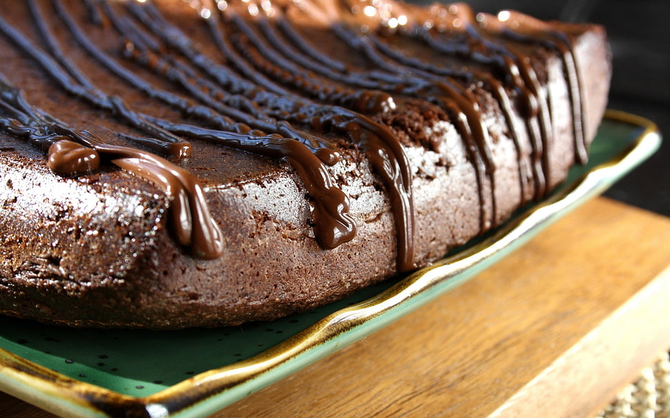 brown chocolate cake on green plate HD wallpaper