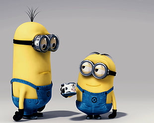 minion holding cup and minion standing in front