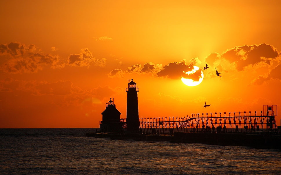black lighthouse photography during sunset HD wallpaper