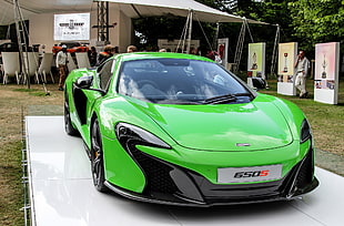 green and black Mclaren sports coupe HD wallpaper