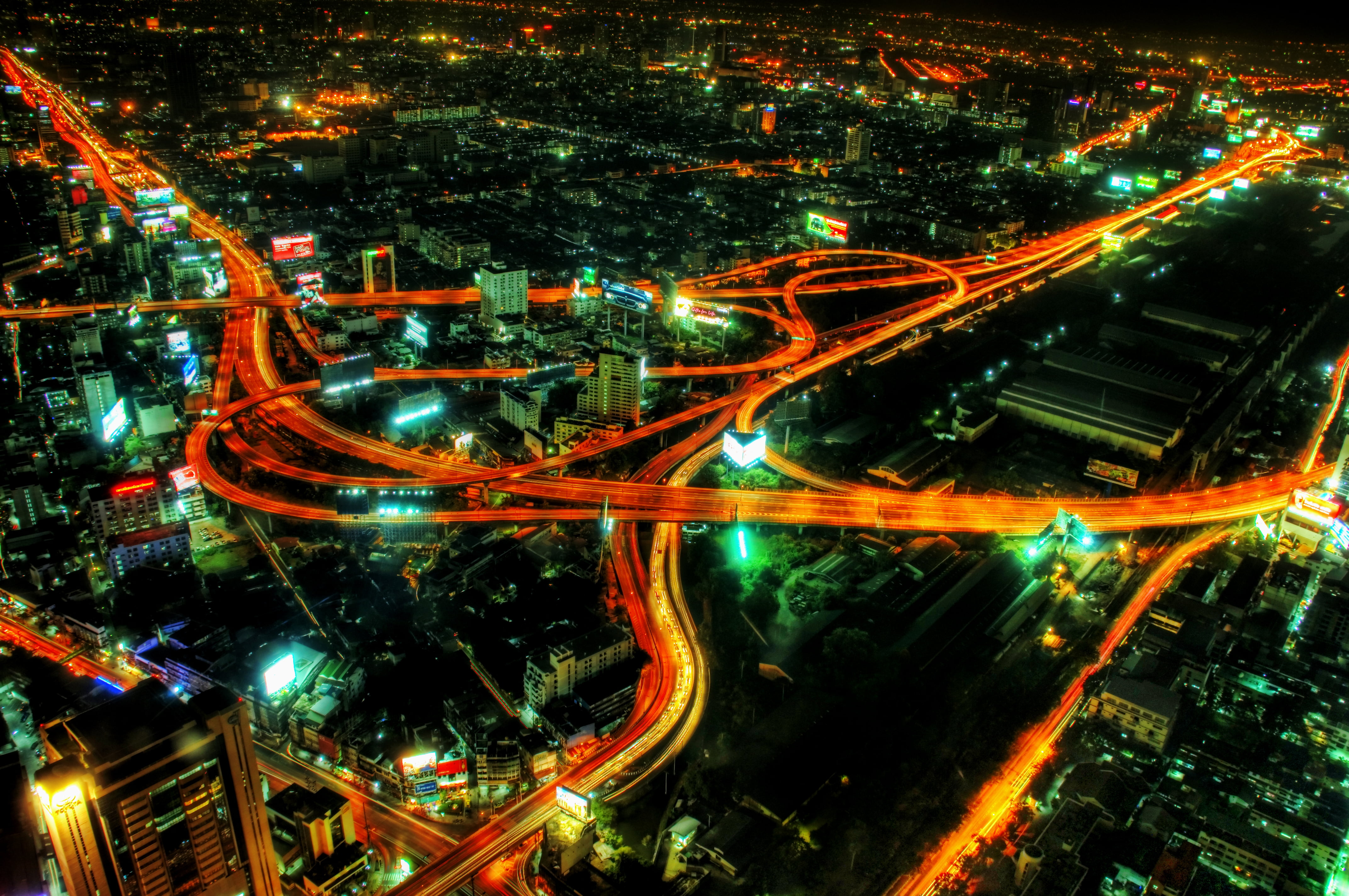 aerial view of city buildings in time lapse photography during nighttime, bangkok
