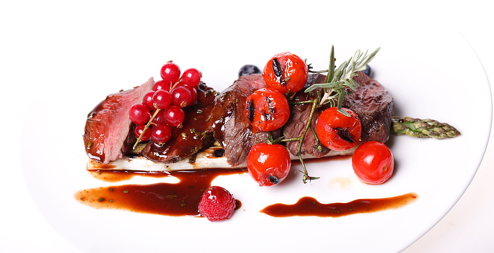 steak with cherry on plate HD wallpaper
