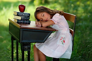 girl in white dress sleeping on chair HD wallpaper