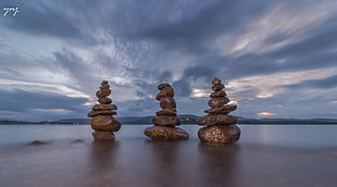 three piled stones