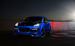 stock photography of blue 5-door hatchback