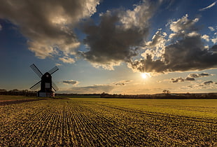 black windmill near open field during daytime HD wallpaper