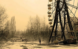 sepia photography of person standing near ferris wheel, Chernobyl, Russian, Pripyat, apocalyptic