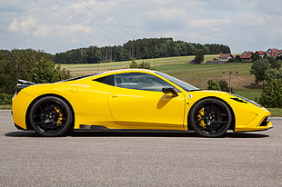 yellow Ferrari car