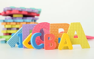 photography of assorted colored alphabets