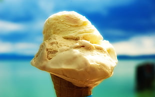 yellow ice cream in cone