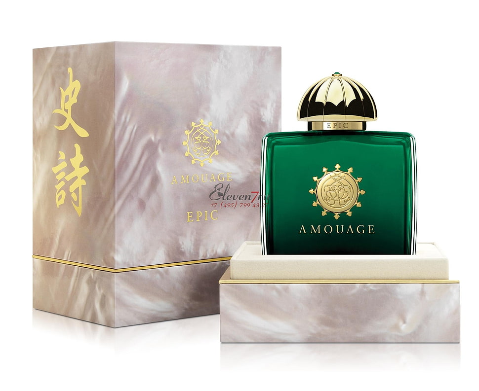 Amouage fragrance spray bottle with brown box HD wallpaper