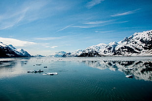 photo of reflection on ice mountain