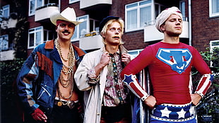 three man wearing costume