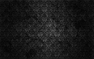 closeup photo of black and white floral textile