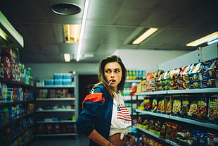 women's white and red crop top and blue and orange jacket, stores, chips, women, belly