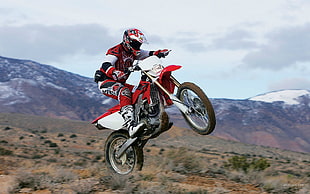 red and black naked motorcycle, motocross, mountains