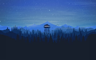 truss tower overlooking forest during nighttime