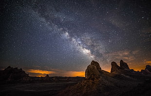 brown rock and galaxy wallpaper, landscape, stars
