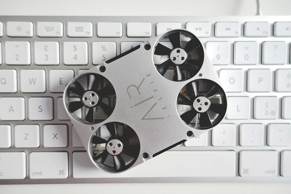 grey Air Selfie on white MacBook HD wallpaper