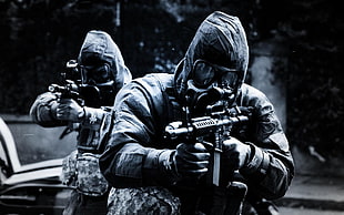 grayscale photo of two SWAT's
