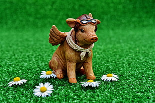 brown pig with daisy flower figurine