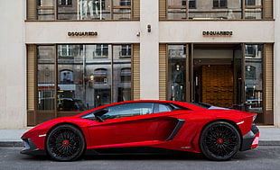 red Lamborghini sports coupe HD wallpaper