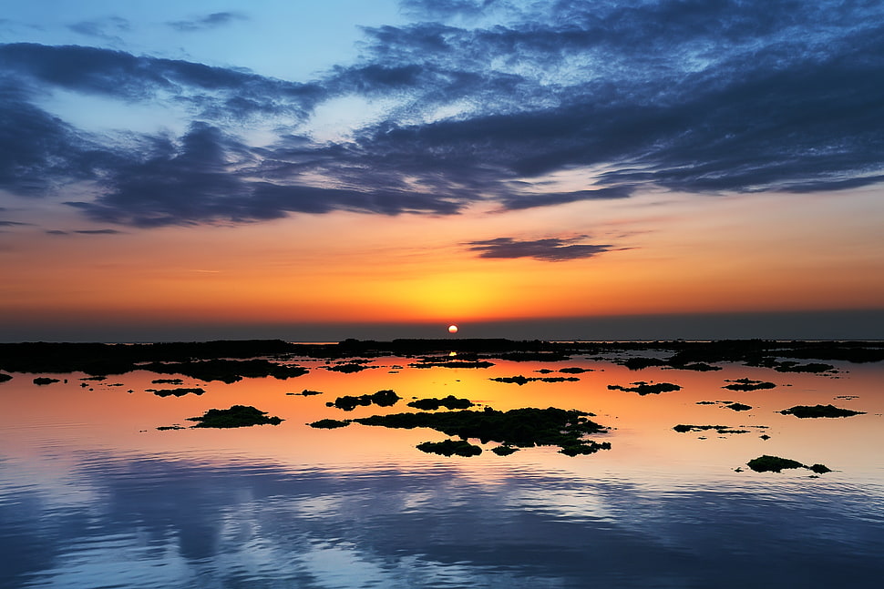 silhouette of thousand islands during sunset HD wallpaper