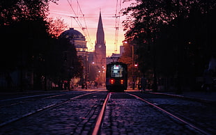 photo of tram during golden hour HD wallpaper