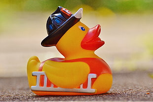yellow and red firefighter rubber duck HD wallpaper