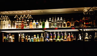 assorted liquor bottles on shelf, beer, vodka, alcohol
