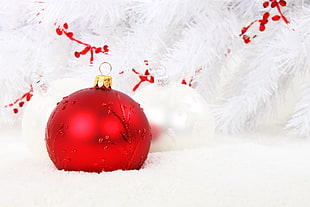 three red and white Christmas baubles HD wallpaper