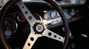 gray and brown Datsun vehicle steering wheel, Datsun