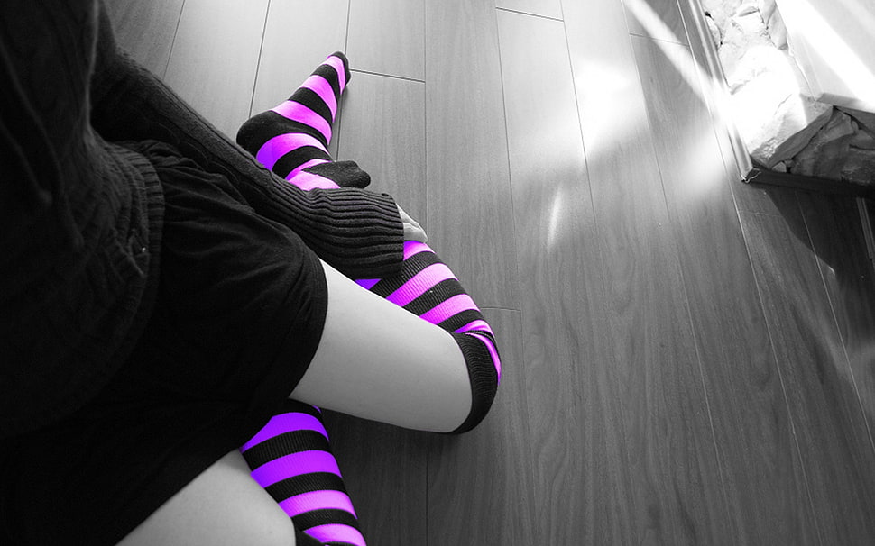 selective color photography of a person in pair of purple stripes high-socks HD wallpaper