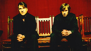 two men sitting on chair HD wallpaper