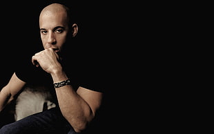 Vin Diesel wearing black crew neck shirt