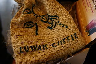 brown Luwak Coffee bag HD wallpaper