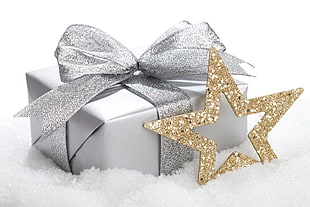 gray present box with gold star decor