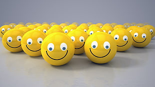 lot of round yellow smiley toys HD wallpaper
